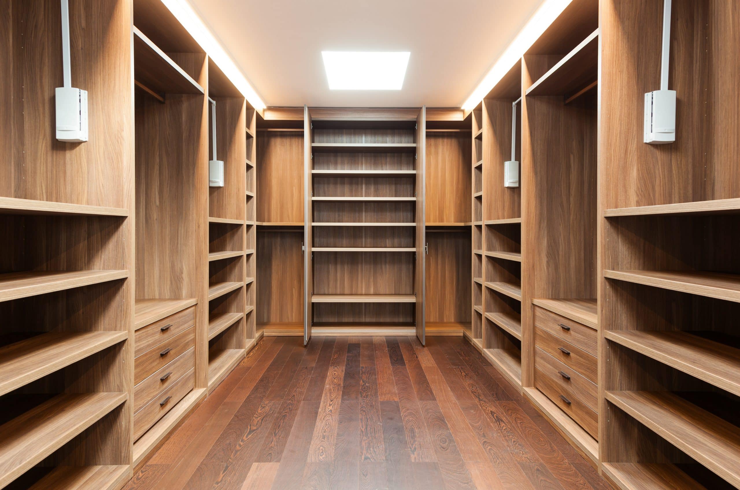 wide wooden dressing room, interior of a modern house
